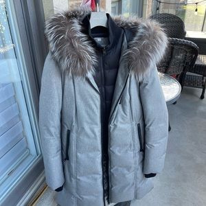 Soia & Kyo knee length women’s winter coat. Detachable fur trim on hood.